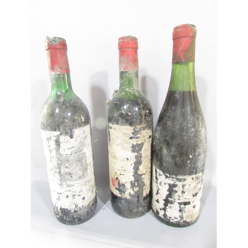 542A - Eight bottles of vintage red wine, indistinguishable distressed labels, one bottle of 1985 Bouchard ... 