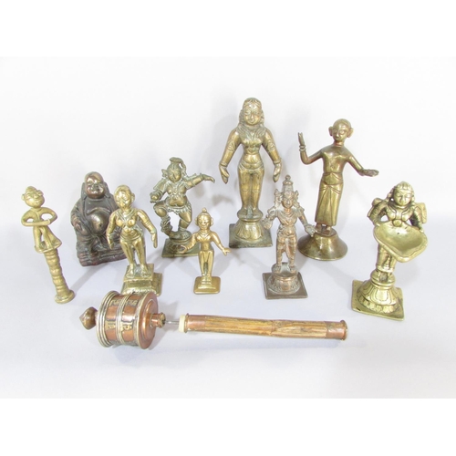 640 - A collection of eight various brass Indian Hindu deities and temple figures, a Buddha, and a small T... 