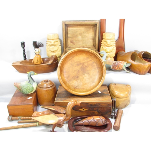 646A - A large collection of wooden items, including clogs, ducks, boxes, fruit bowl, jar, tribal figure et... 