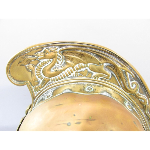 650 - Brass Merryweather pattern fireman's helmet with high comb, dragon embossed detail, standard firebri... 