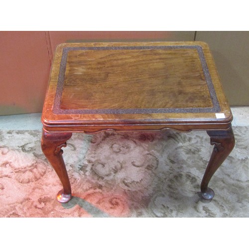 1212 - A small Georgian style mahogany upholstered stool raised on claw and ball supports, together with a ... 