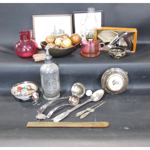 536 - A miscellaneous collection of items including some wooden fruit, a W. Everett Cromer Soda Siphon, a ... 