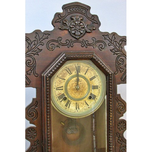 526 - Two American mantle clocks by the Ansonia Company and Seth Thomas, one with gingerbread casework