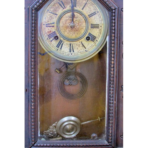 526 - Two American mantle clocks by the Ansonia Company and Seth Thomas, one with gingerbread casework