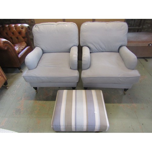 1275 - A pair of Sofa workshop contemporary Howard style easy chairs with pale blue upholstery and loose cu... 