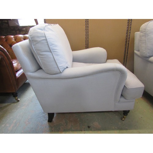 1275 - A pair of Sofa workshop contemporary Howard style easy chairs with pale blue upholstery and loose cu... 