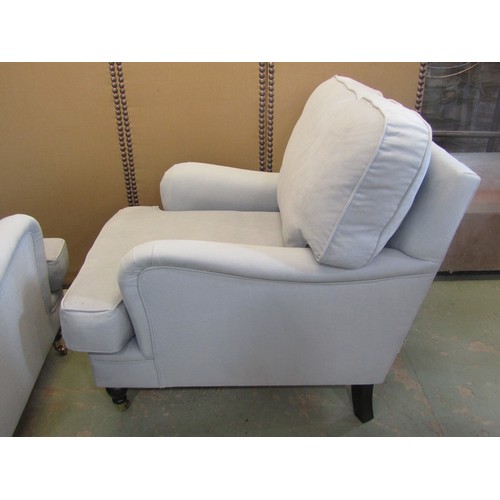 1275 - A pair of Sofa workshop contemporary Howard style easy chairs with pale blue upholstery and loose cu... 