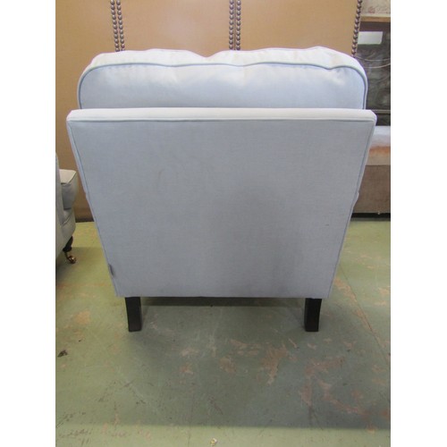 1275 - A pair of Sofa workshop contemporary Howard style easy chairs with pale blue upholstery and loose cu... 