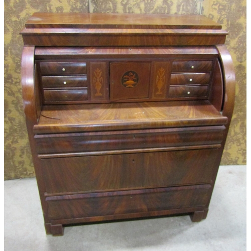 1211A - 19th century continental mahogany cylinder bureau, enclosing a fitted interior of drawers, pigeon ho... 