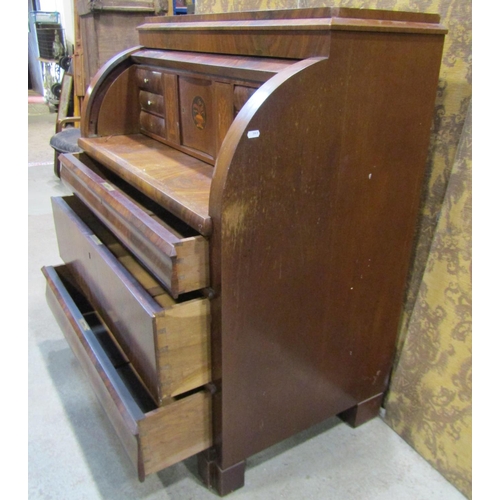 1211A - 19th century continental mahogany cylinder bureau, enclosing a fitted interior of drawers, pigeon ho... 