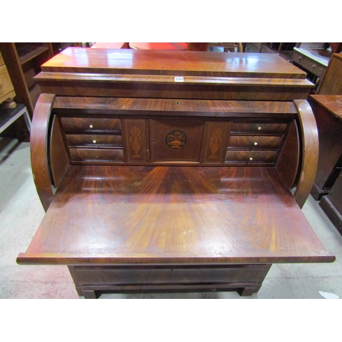 1211A - 19th century continental mahogany cylinder bureau, enclosing a fitted interior of drawers, pigeon ho... 