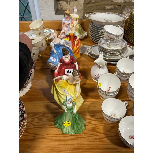 63 - Seven Doulton figures comprising Ninette, Sharon, Autumn Attraction, Summer Serenade, Winter Welcome... 