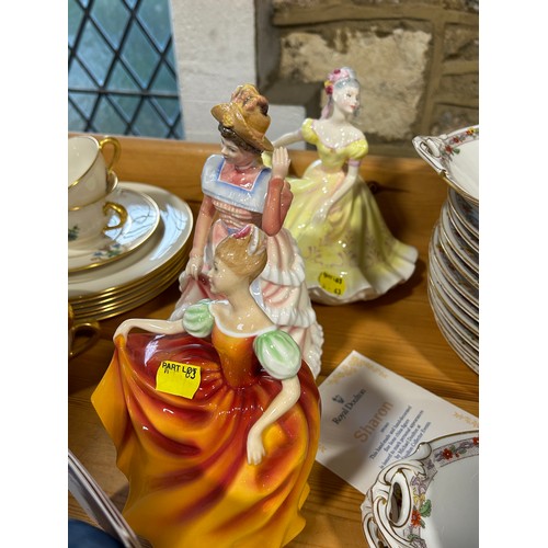 63 - Seven Doulton figures comprising Ninette, Sharon, Autumn Attraction, Summer Serenade, Winter Welcome... 