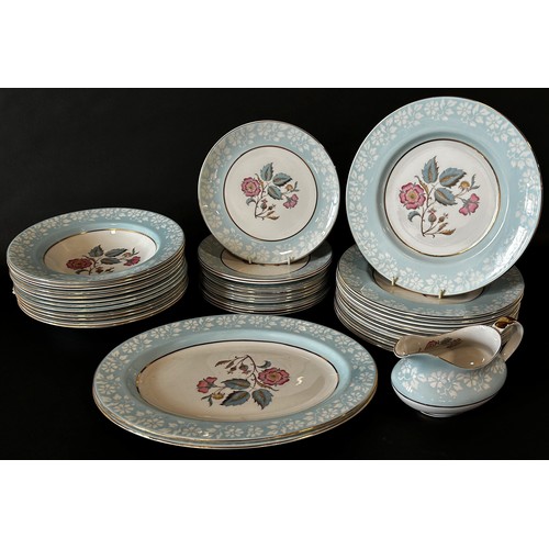 A collection of Imperial Jasper Rose dinnerware comprising four tureens, twelve dinner plates, eleven soup bowls, thirteen further plates, together with a gravy boat