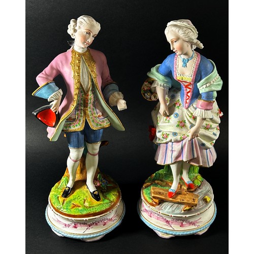 60 - A pair of 19th century German bisque figures of male and female characters in 18th century dress, ra... 