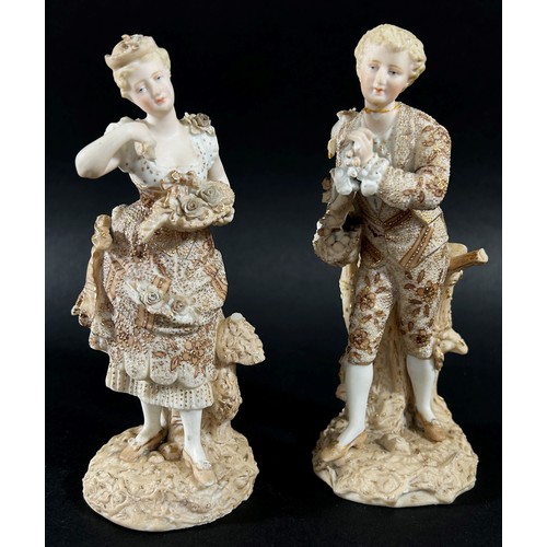 94 - Two pairs of continental porcelain figures, one with hand painted detail showing male and female cha... 