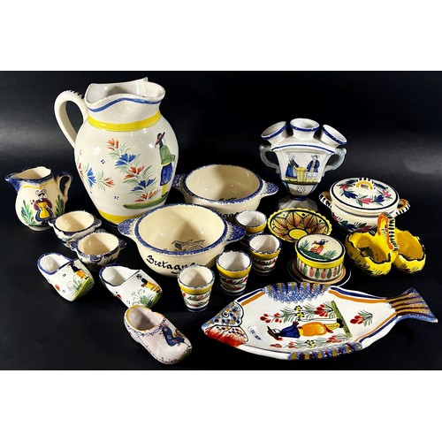 98 - A large quantity of Quimper Faience to include plates, vases, candlesticks, jugs etc