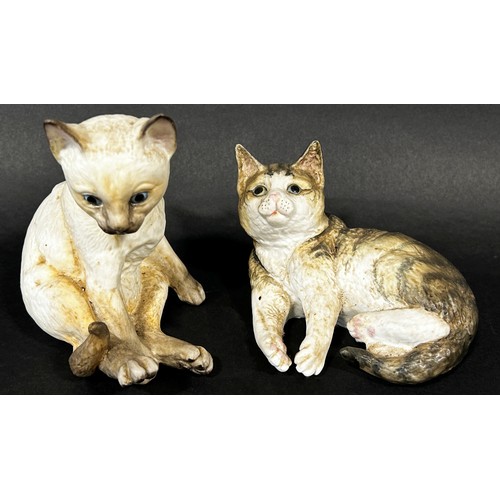 101 - Four Royal Crown Derby figural candlesticks (4) together with two Royal Worcester ceramic kittens, S... 