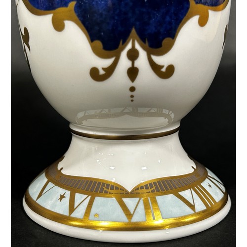 78 - A Royal Worcester trumpet shaped vase, commemorating the Year 2000 millennium with, original box