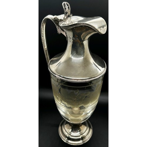 A Regency style silver and glass claret jug with etched grape and vine decoration and a beaded handle and foot, London 1983, maker J. A. Campbell, 28cm high