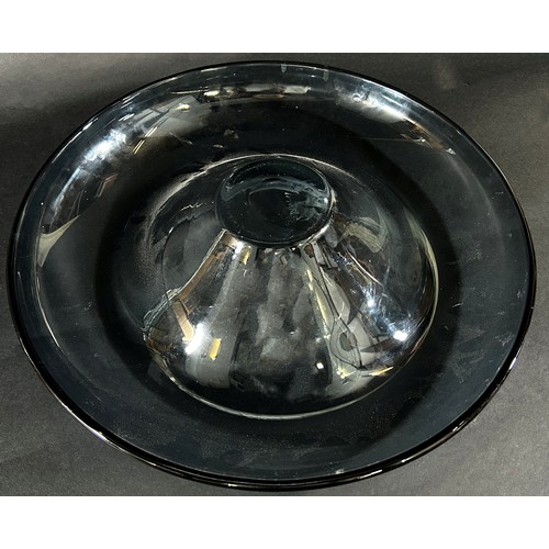 121 - A Schott Zwiesel smoked glass shallow bowl with a rounded downturned rim, maker’s stamp to base, 38c... 