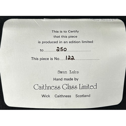 128 - A limited  edition Caithness ‘Swan Lake’ cube paperweight, No 122/250, 6cm with a certificate and or... 