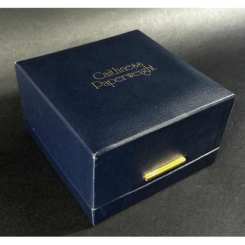 128 - A limited  edition Caithness ‘Swan Lake’ cube paperweight, No 122/250, 6cm with a certificate and or... 