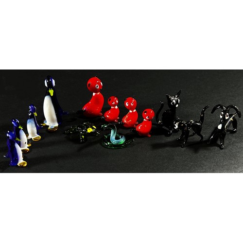 131 - A collection of  hand made Venetian glass animals, including a Mounted Fox Hunting set with pack of ... 