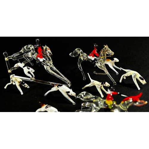 131 - A collection of  hand made Venetian glass animals, including a Mounted Fox Hunting set with pack of ... 