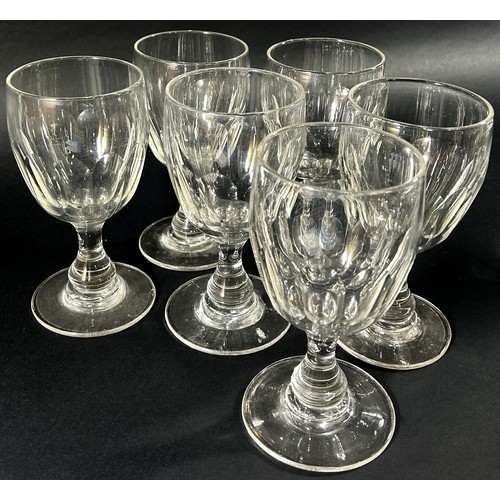 136 - Ten cut glass Champagne bowls with facetted stems, together with six near matching red wine glasses ... 