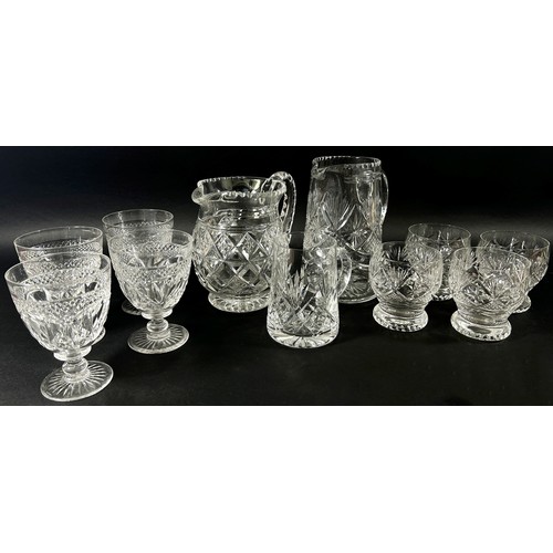 145 - A mixed selection of cut glass table ware including, Brandy glasses, wines, rounded tumblers, three ... 