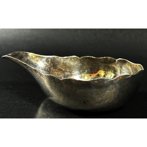 191 - A silver metal pap boat, 12cm wide, (unmarked)