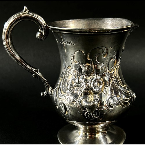 192 - A heavily engraved Victorian silver milk jug, London 1872, makers Daniel & Charles Houle, 10cm high,... 