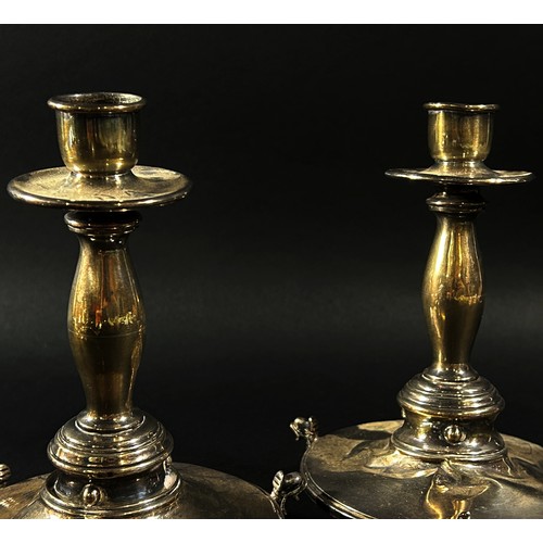 193 - A pair of silver candlesticks (both AF) hallmarks rubbed