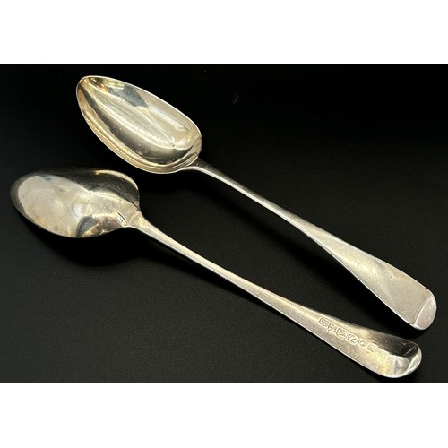 209 - Three silver serving spoons and two dessert spoons, hallmarked T & Q respectively, Sheffield 1911, 1... 