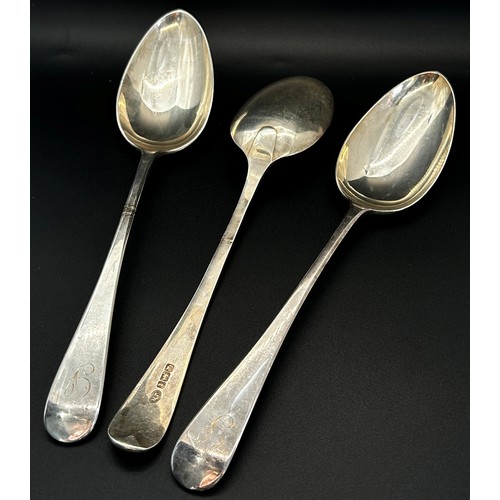 209 - Three silver serving spoons and two dessert spoons, hallmarked T & Q respectively, Sheffield 1911, 1... 