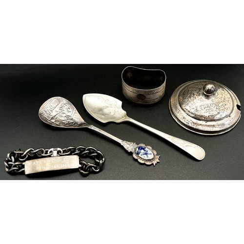 167 - Four small silver trophies, a silver jar lid, two silver spoons, a napkin ring and a bracelet, 8 oz ... 