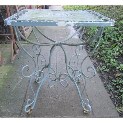 1013 - A light green painted steel garden terrace table, the square top with rounded corners and decorative... 