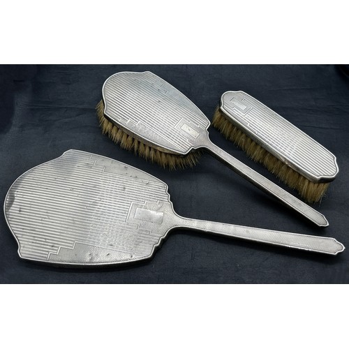 163A - A group of silver Birmingham vanity pieces, including hairbrushes, mirror and a 20th Century silver ... 