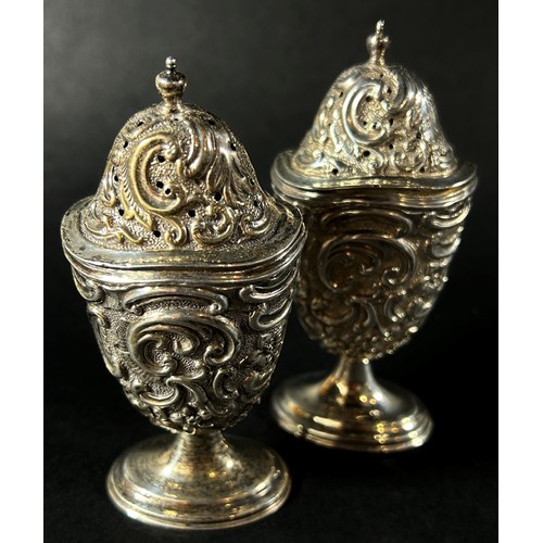 169 - A mixed selection of silver to include Georgian style sauce boat, three bonbon dishes and a pair of ... 