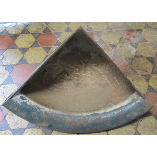 1043 - An old heavy gauge cast iron wall mounted corner stable trough with enamelled interior and over pain... 