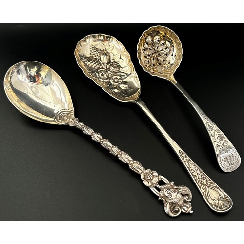 203 - A late Victorian silver sugar sifting spoon with pineapples to the bowl, London 1898, maker William ... 