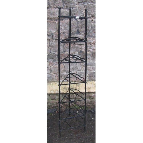 1068 - A light painted steel saucepan stand on seven graduated tiers 138 cm (full height)