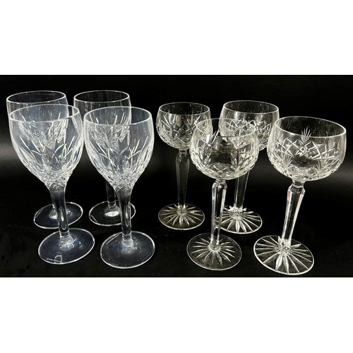 138 - Six cut glass wine glasses with facetted cut stems, together with further wine glasses , Hock glasse... 