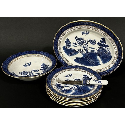11 - An extensive collection of Booths ‘Real Old Willow’ pattern tableware, graduated plates, tureens, co... 