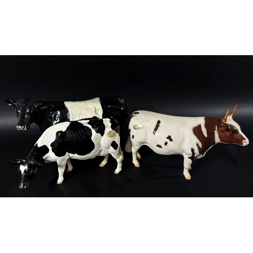 67 - A collection of Beswick and other figures to include a Jersey bull, an Ayrshire bull, border Fine Ar... 