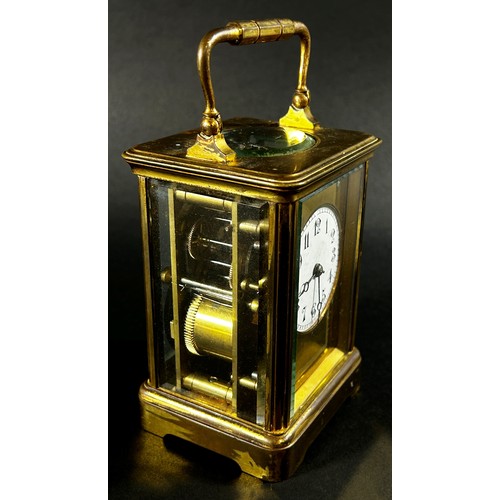 445 - A 19th century French carriage clock with enamelled dial and eight day striking movement, currently ... 