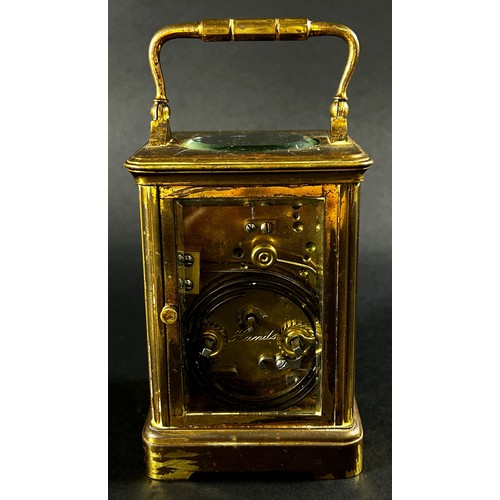 445 - A 19th century French carriage clock with enamelled dial and eight day striking movement, currently ... 