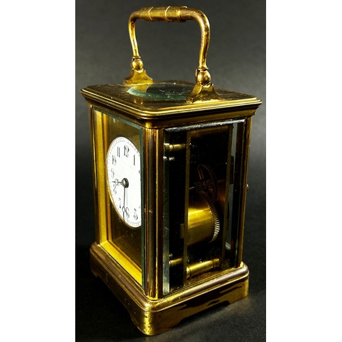 445 - A 19th century French carriage clock with enamelled dial and eight day striking movement, currently ... 