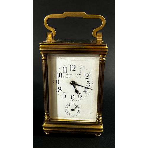 443 - A late 19th century brass carriage clock with eight day striking movement, currently running